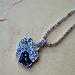 Pair of Hearts Pendant: One Silver, One Black, With a Unique Patterned Silver Chain