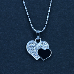 Pair of Hearts Pendant: One Silver, One Black, With a Unique Patterned Silver Chain