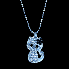 Cute Cat Pendant covered in Shiny Silver Gems, Small Black Stone Flower on its Head