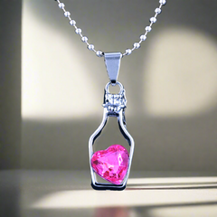 Silver Bottle Chain with a Pink Heart Crystal Pendant Inside Hanging on a Unique Patterned Chain